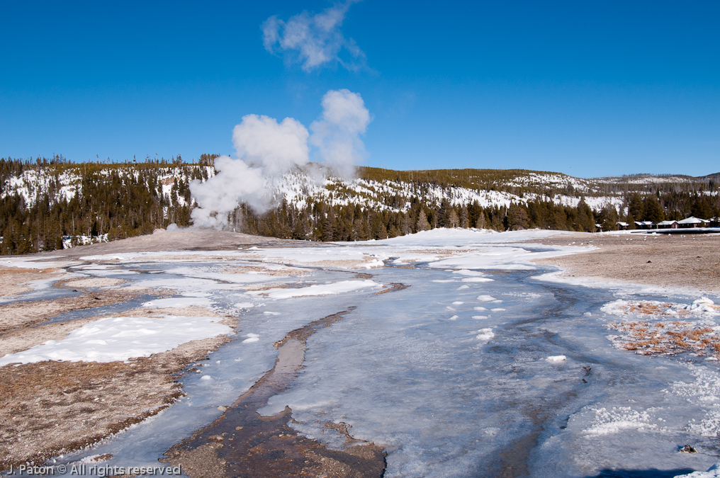 Old Faithful Geyser with Icy Runoff   Old Faithful Area, Yellowstone National Park, Wyoming